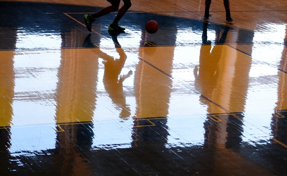 Archbishop Carroll High School basketball players work out during practice on Feb. 12, 2015 in Washington, DC. (Photo by Jonathan Newton/The Washington Post via Getty)