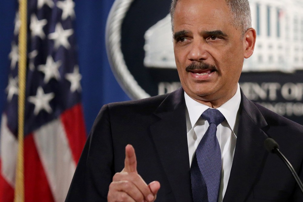 Attorney General Eric Holder delivers remarks about the Justice Department's findings related to two investigations in Ferguson, Mo. at the Robert F. Kennedy Department of Justice Building on March 4, 2015 in Washington, DC.