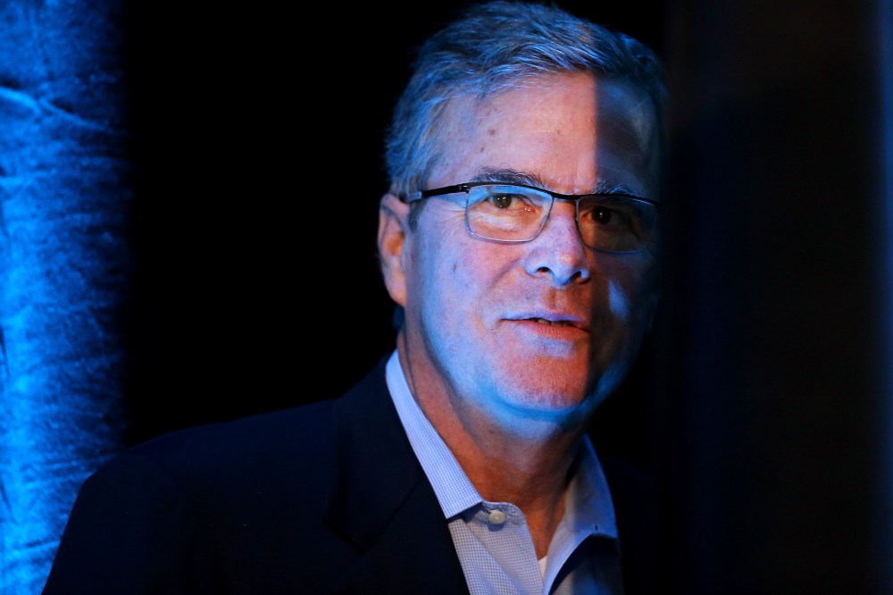 Former Florida Governor Jeb Bush waits to be introduced at the Iowa Ag Summit on March 7, 2015 in Des Moines, Iowa. (Photo by Scott Olson/Getty)
