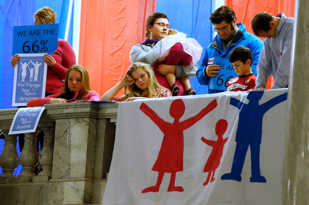 Demonstrators hold an anti-gay marriage rally inside the Utah State Capitol on Jan. 28, 2014.