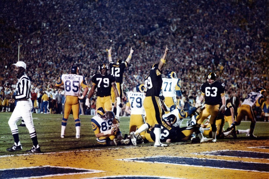 Quarterback Terry Bradshaw #12 of the Pittsburgh Steelers along with other teammates celebrate after scoring a touchdown during Super Bowl XIV against the Los Angeles Rams on Jan. 20, 1980 at the Rose Bowl in Pasadena, Calif.