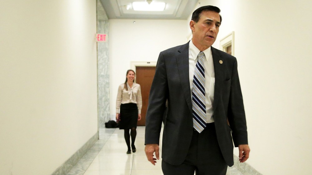 Rep. Darrel Issa (R-CA) returns to his office after votes on the House floor March 6, 2014 on Capitol Hill in Washington, DC.