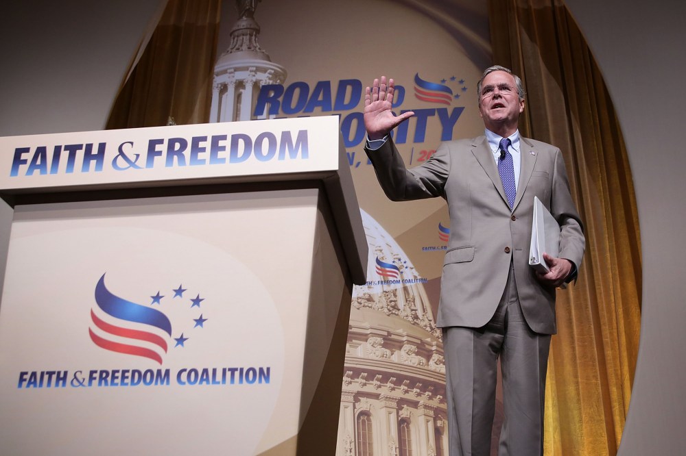 Republican U.S. presidential hopeful and former Florida Governor Jeb Bush waves after he spoke during the "Road to Majority" conference June 19, 2015 in Washington, D.C. (Photo by Alex Wong/Getty)