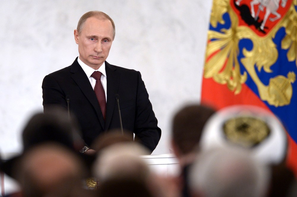 Russia's President Vladimir Putin addresses a joint session of Russian parliament on Crimea in the Kremlin in Moscow, on March 18, 2014