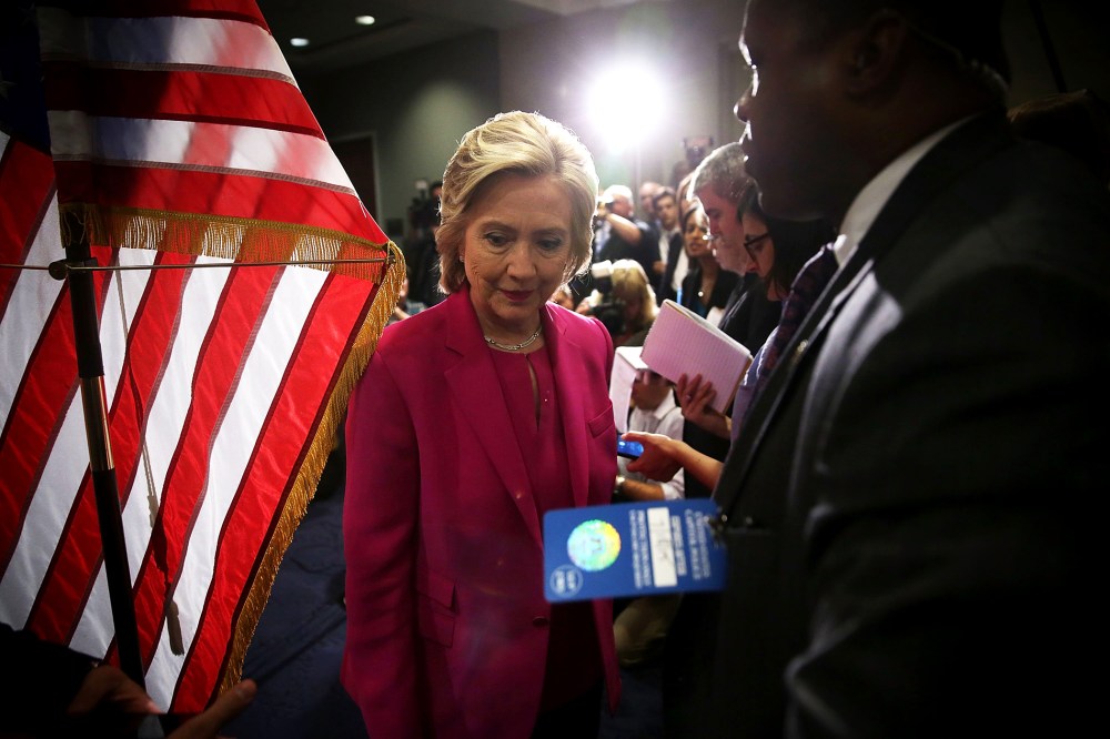 Democratic U.S. presidential hopeful and former U.S. Secretary of State Hillary Clinton leaves the podium after she spoke to members of the media July 14, 2015 on Capitol Hill in Washington, D.C. (Photo by Alex Wong/Getty)