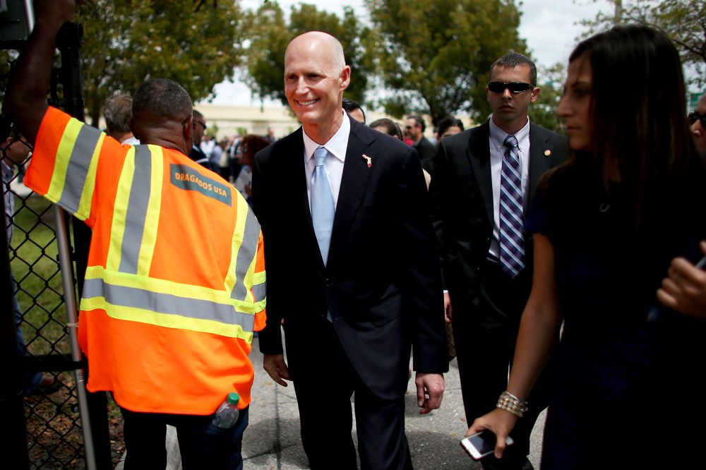 Florida Governor Rick Scott attends the ribbon cutting for the opening of a I-595 Express Project in Davie, Fla., Mar. 28, 2014.