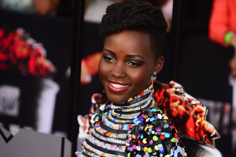 Lupita Nyong'o arrives on the red carpet for the 2014 MTV Movie Awards, April 13, 2014.