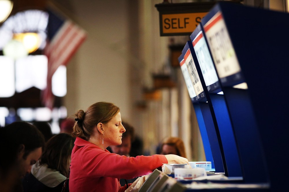 Last Minute Tax Filers Mail Their Forms On Tax Day