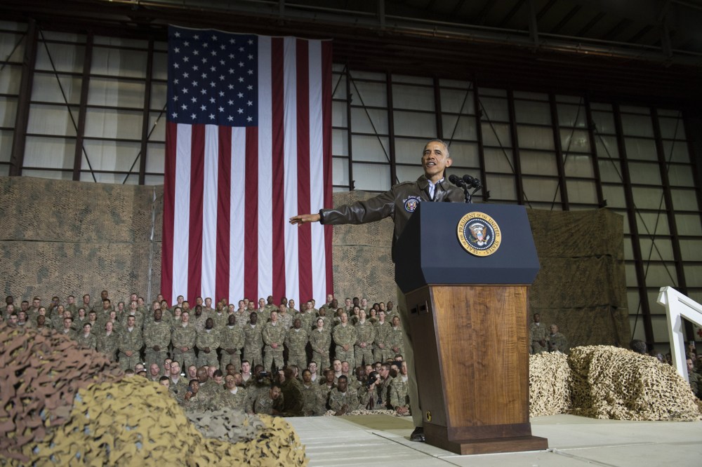 President Barack Obama speaks during a surprise visit with US troops at Bagram Air Field, north of Kabul, in Afghanistan, May 25, 2014, prior to the Memorial Day holiday.