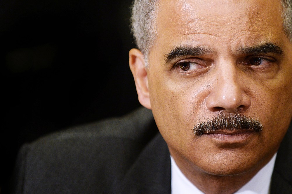 U.S. Attorney General Eric Holder attends a meeting on May 30, 2014 in Washington, D.C. (Photo by Olivier Douliery/Pool/Getty)
