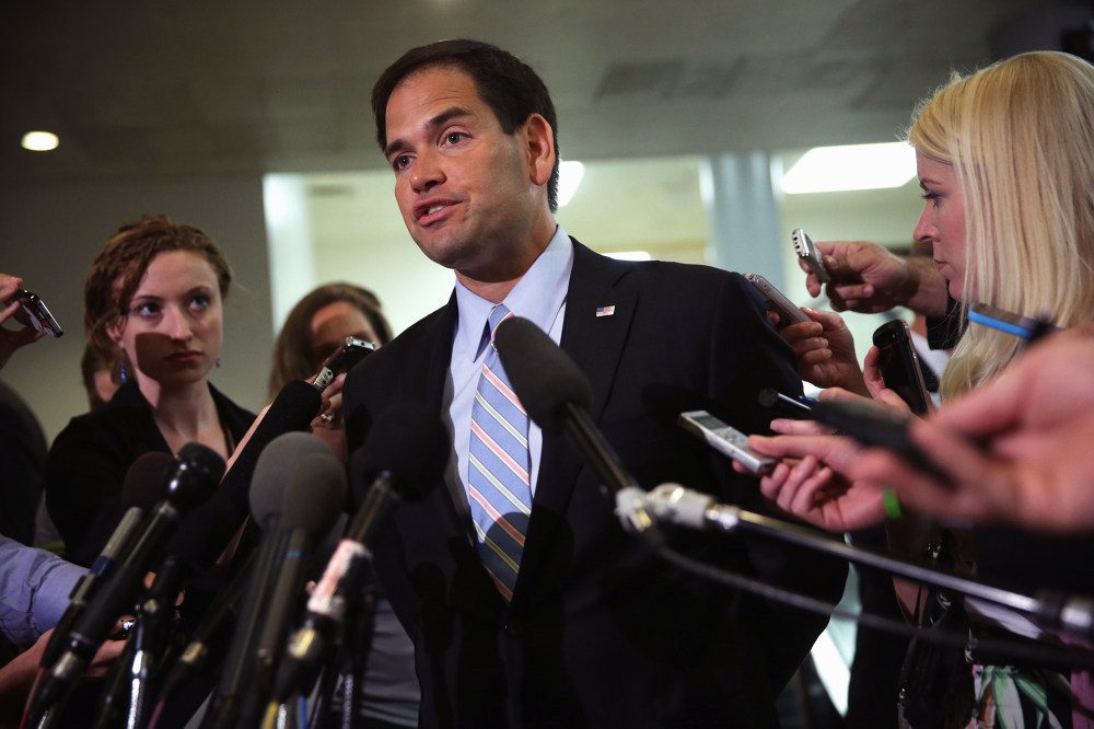 Sen. Marco Rubio (R-Fla.) talks to reporters after a closed door briefing June 4, 2014 on Capitol Hill in Washington, D.C.