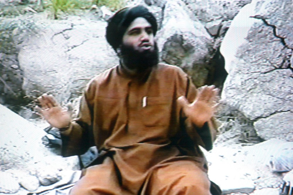 A frame grab from the Saudi-owned television network MBC shows Suleiman Abu Ghaith claiming responsibility for the September 11 suicide attacks in the United States in an undated videotape broadcast by the Dubai-based MBC, April 17, 2002.