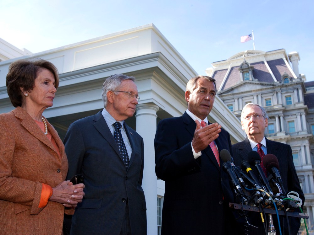 Speaker John Boehner (R-OH)  speaks to the media, accompanied by (from left) House Minority Leader Nancy Pelosi (D-CA), Senate Majority Leader Harry Reid (D-NV),  and Senate Minority Leader Mitch McConnell (R-KY),  at the White House after meeting with...