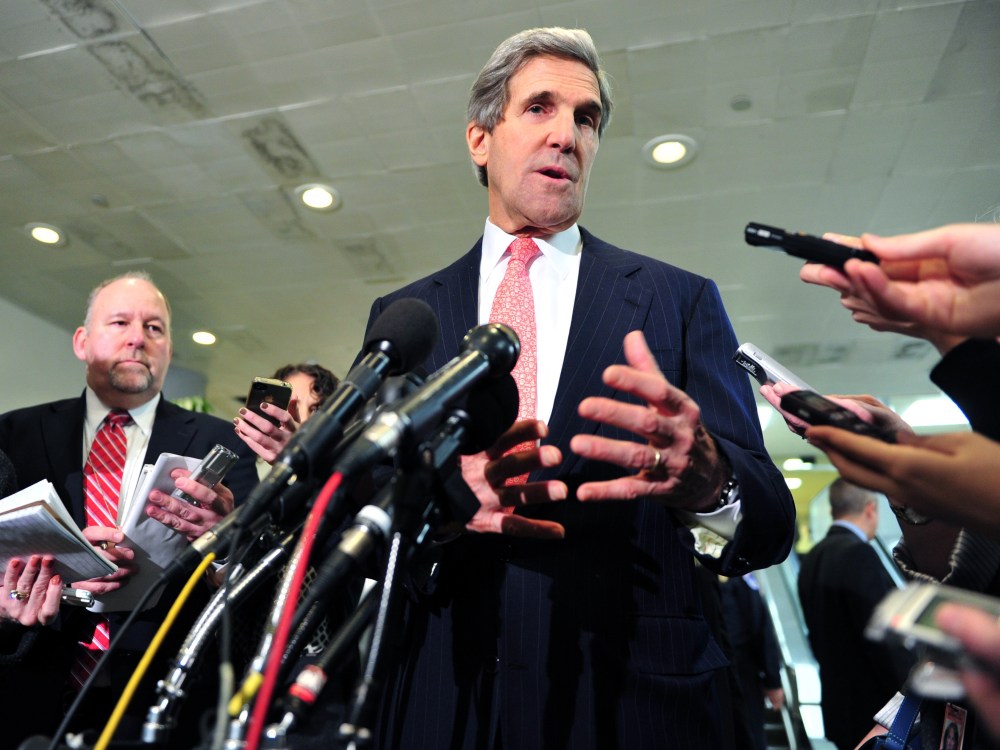 US Senate Foreign Relations Committee Chairman Sen. John Kerry (C), D-MA, speaks to reporters on December 19, 2012 on Capitol Hill in Washington, DC  following a full committee closed door briefing on the Benghazi. (Photo by Karen Bleier/AFP/Getty Images)