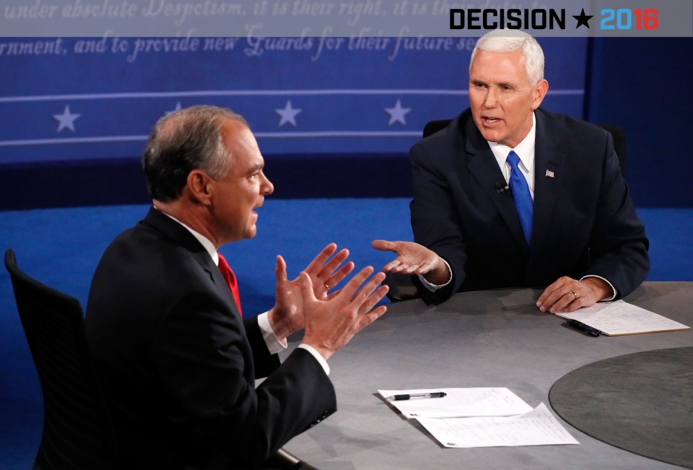 Democratic vice presidential nominee Tim Kaine  and Republican vice presidential nominee Mike Pence speak during the Vice Presidential Debate at Longwood University on Oct. 4, 2016 in Farmville, Va. (Photo by Andrew Gombert/Pool/Getty)