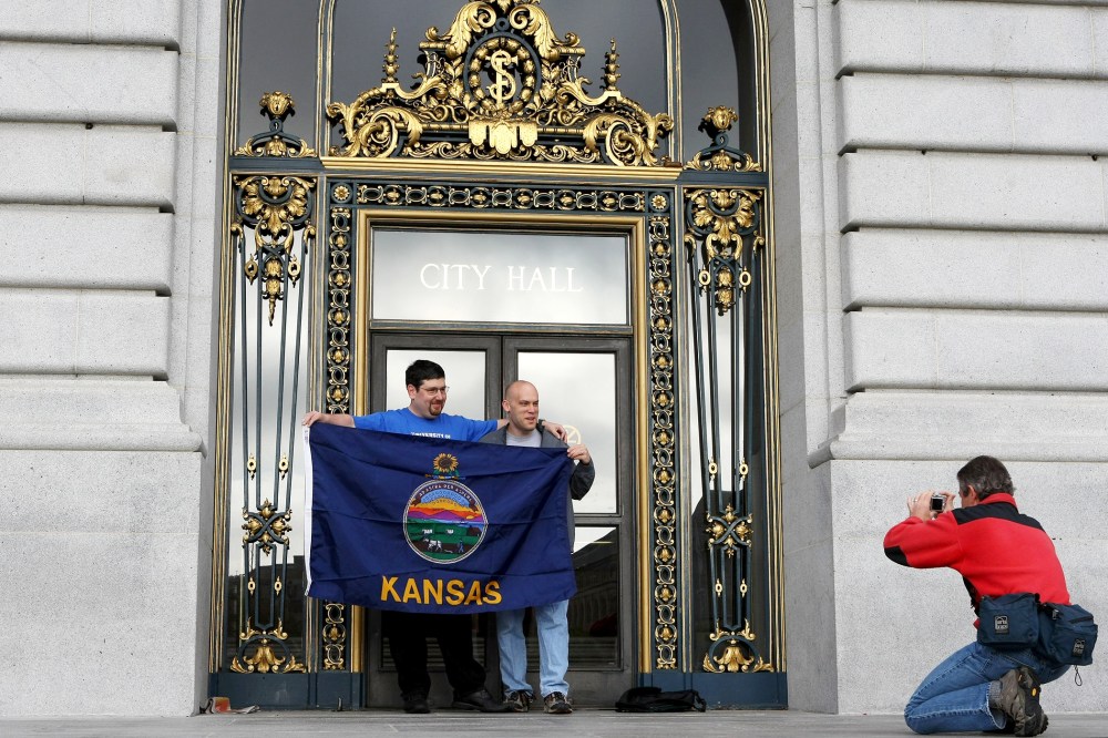Same-sex couple David Greenbaum and Mike Silverman of Kansas have their picture taken before being married at San Francisco City.