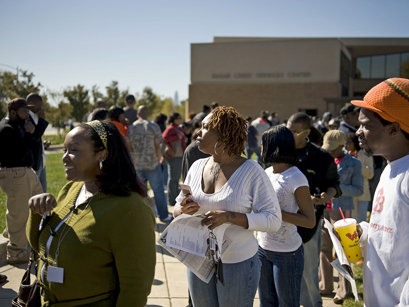 Early voters line up outside of the Sugar Creek branch library on North Tryon Street on October 31, 2008 in Charlotte, North Carolina.  (Photo by Davis Turner/Getty Images)