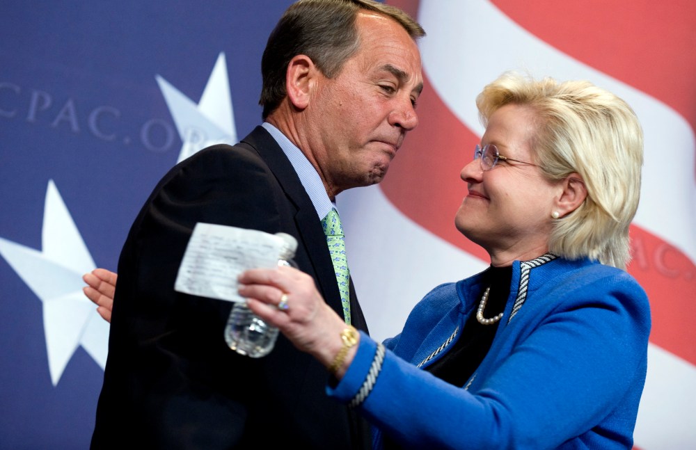 Cleta Mitchell of American Conservative Union, hugs House Minority Leader John Boehner, R-Ohio, before he addressed the Conservative Political Action Conference (CPAC) held at the Marriott Wardman Park hotel, Feb. 18, 2010.