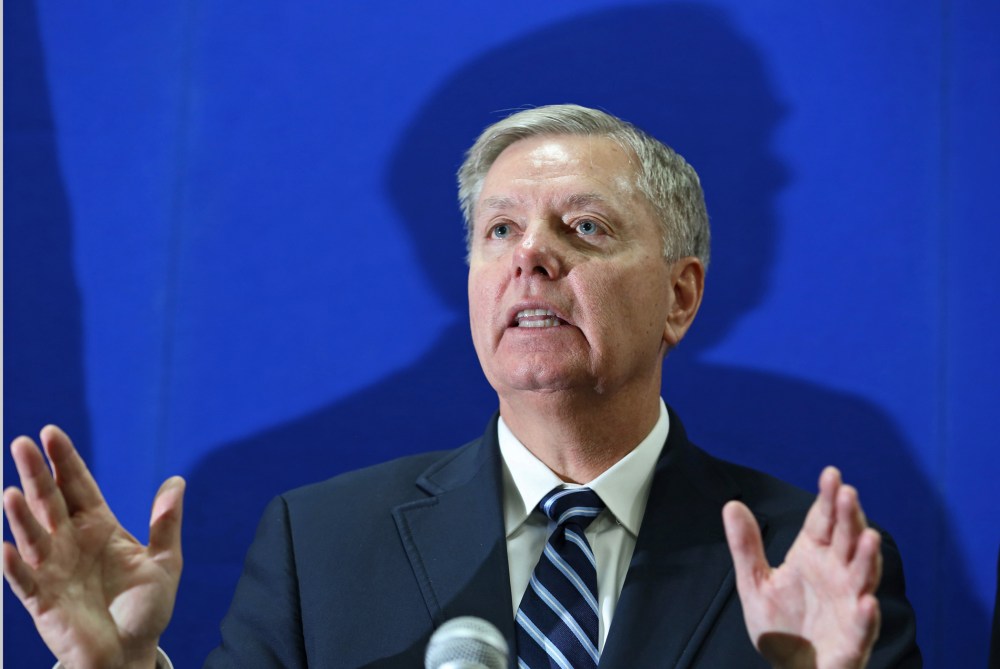Sen. Lindsey Graham addresses a press conference at the U.S. Embassy in Kabul, Afghanistan, Thursday, Jan. 2, 2014.