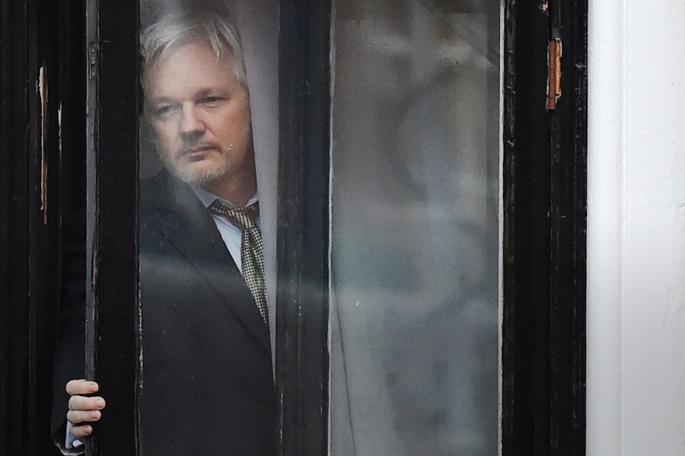 This file photo taken on Feb. 05, 2016 shows WikiLeaks founder Julian Assange coming out on the balcony of the Ecuadorian embassy to address the media in central London. (Photo by Ben Stansall/AFP/Getty)