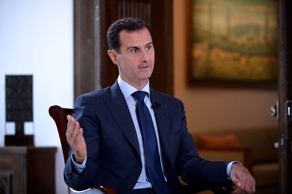 A handout picture released by the official Syrian Arab News Agency (SANA) on July 14, 2016 shows Syrian President Bashar al-Assad speaking during an interview with NBC News in the capital Damascus. (Photo by SANA/Handout/AFP/Getty)