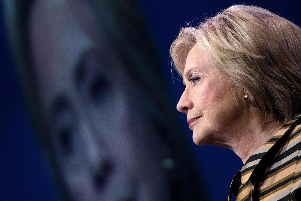 Democratic presidential nominee Hillary Clinton pauses while speaking during the Congressional Hispanic Caucus Gala on Sept. 15, 2016 in Washington, D.C. (Photo by Brendan Smialowski/AFP/Getty)