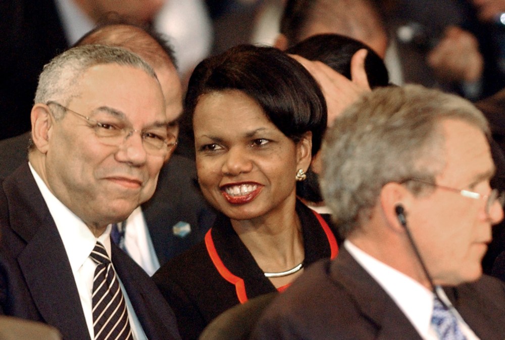 Then-Secretary of State Colin Powell and U.S. National Security Adviser Condoleezza Rice during the plenary session of the Special Summit of the Americas in Monterrey, Mexico, Jan. 13, 2004. (Photo by Jaime Puebla/AP)