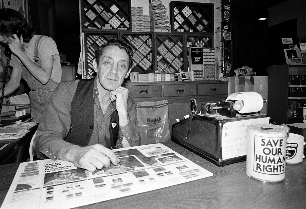 Harvey Milk, a gay political leader in San Francisco, is seen pictured in his camera store on Castro Street on June 28, 1977 in San Francisco. (Photo by STF/AP)