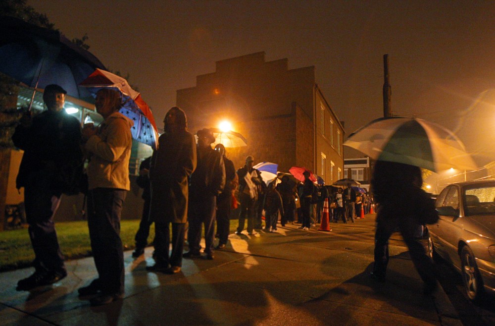 File photo: Voters line up before 6 a.m. outside the City Hall East voting precinct in Richmond, Va., on Tuesday, November 4, 2008. (Eva Russo)