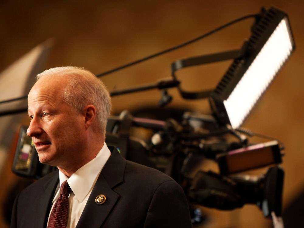 Rep. Mike Coffman, R-Colo., arrives early to talk with reporters during the Colorado Republican election night party at the Doubletree Hotel in Greenwood Village, Colo., Nov. 2, 2010.