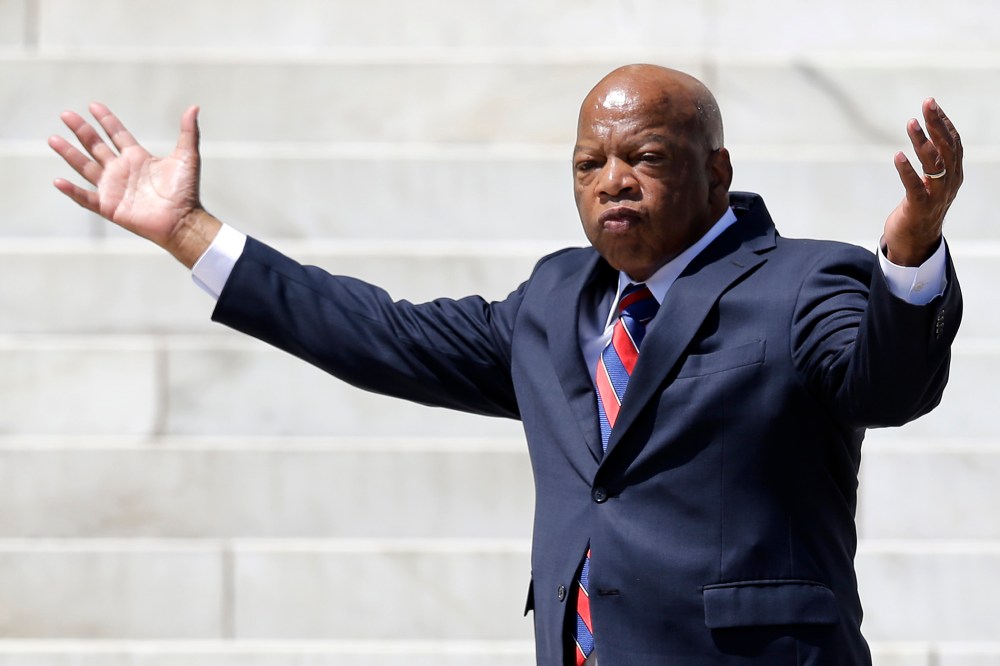 Rep. John Lewis, (D-GA) arrives to speak at a rally to commemorate the 50th anniversary of the 1963 March on Washington on the steps of the Lincoln Memorial on Aug. 24, 2013, in Washington.