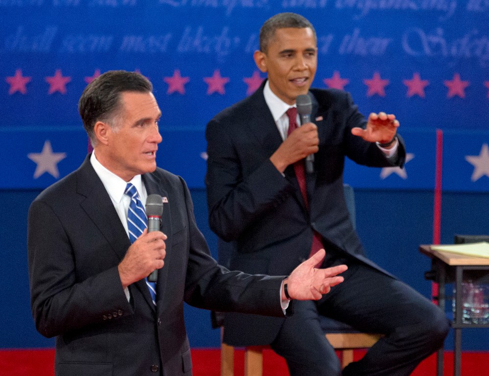 President Barack Obama, right, and Republican presidential candidate, former Massachusetts Gov. Mitt Romney, participate in the presidential debate, Tuesday, Oct. 16, 2012, at Hofstra University in Hempstead, N.Y. (AP Photo/Carolyn Kaster)