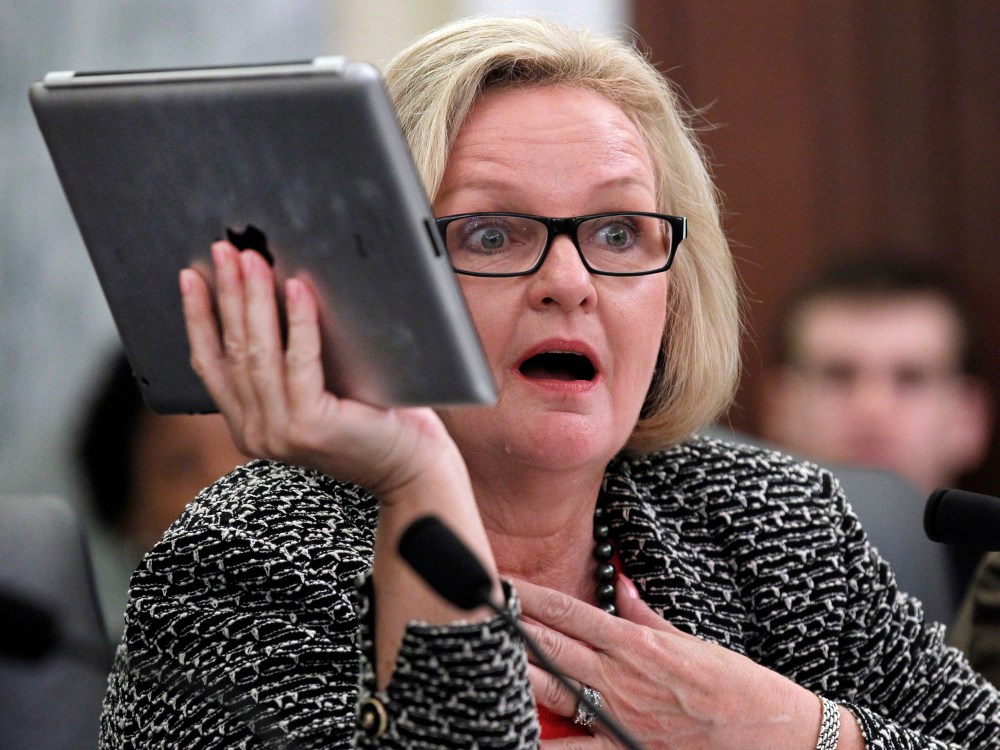 File Photo: Sen. Claire McCaskill, D-Mo., holds up her Apple IPad during a hearing of the Subcommittee on Consumer Protection, Product Safety, and Insurance on cell phone privacy on Capitol Hill Thursday, May 19, 2011 in Washington. (Photo by Alex...