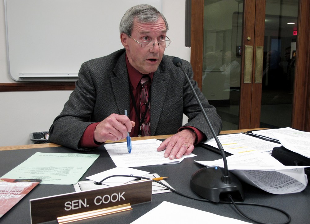 North Dakota state Sen. Dwight Cook, a Republican from Mandan, asks a question during a legislative hearing in Bismarck, N.D. on Nov. 2, 2011.