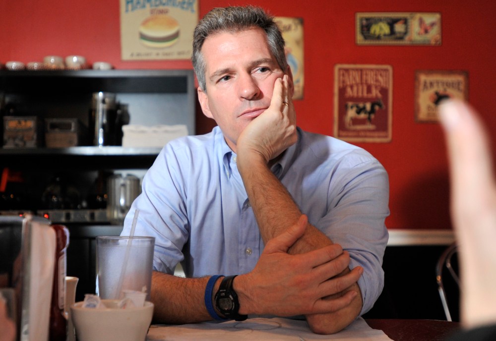 Sen. Scott Brown, R-Mass., speaks with reporters at Mul's Diner in Boston on Dec. 28, 2011.