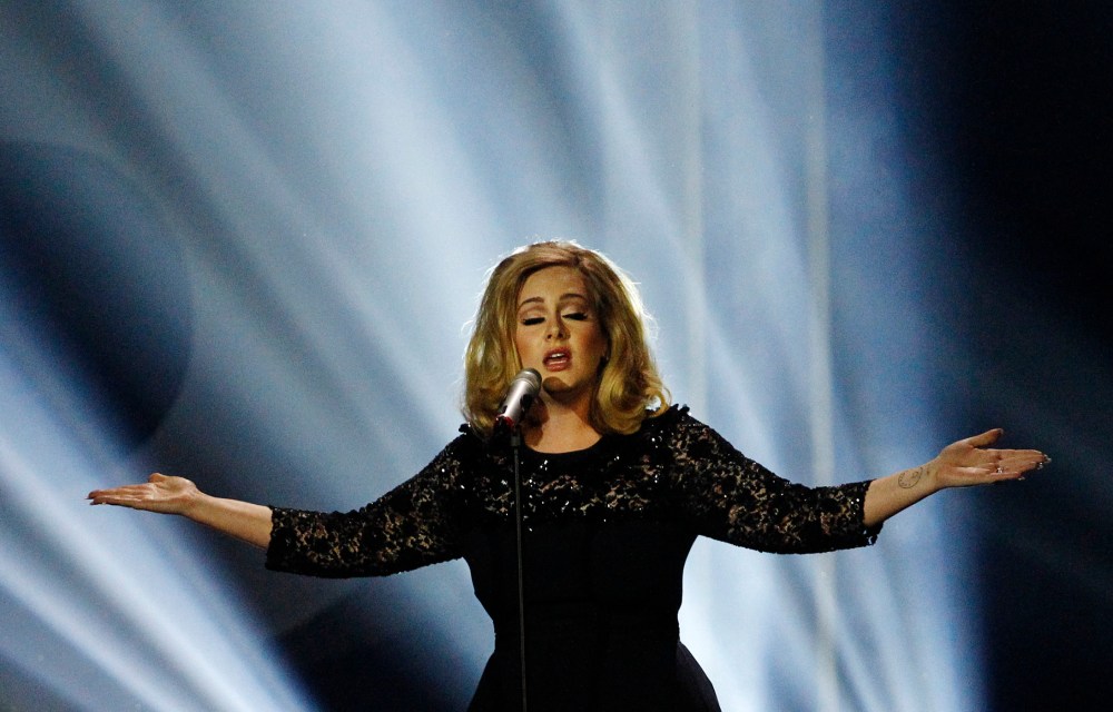Adele performs during the Brit Awards 2012 at the O2 Arena in London, Feb. 21, 2012. (Photo by Joel Ryan/AP)