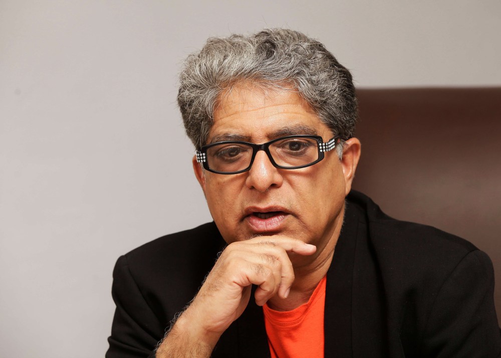 Deepak Chopra gestures during an interview in Bogota, Columbia, May 23, 2012.
