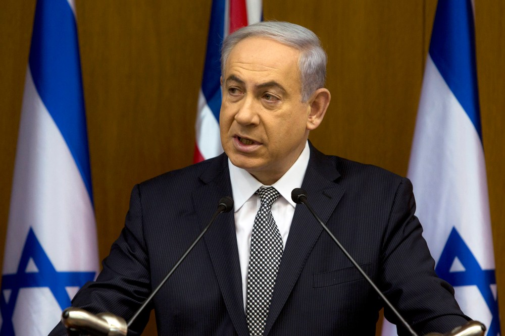 Israeli Prime Minister Benjamin Netanyahu speaks during joint statements with British Foreign Secretary Philip Hammond at the Knesset, Israel's parliament in Jerusalem, July 24, 2014.