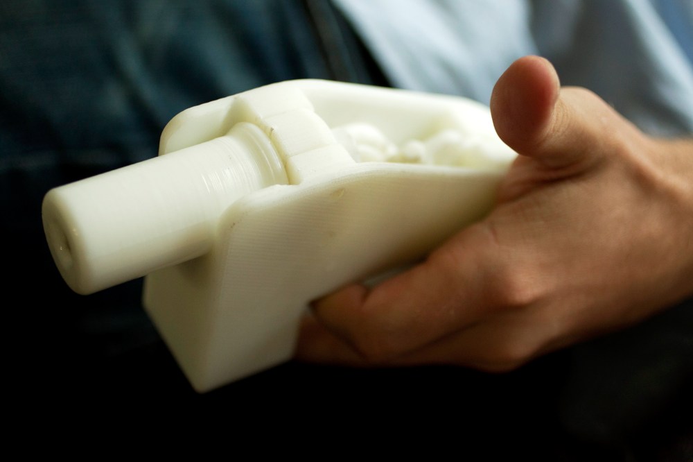 Cody Wilson with the first completely 3D-printed handgun, The Liberator, at his home in Austin, Texas on May 10, 2013.