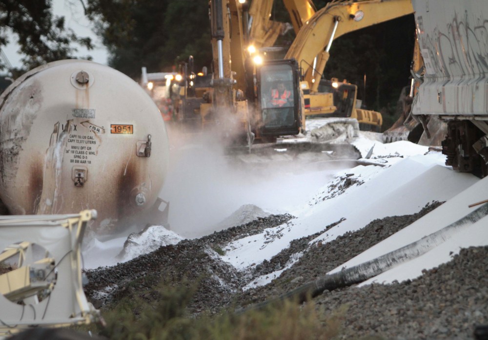 Cleanup on a derailed Union Pacific train in Mer Rouge, La., Oct. 6, 2014. (Photo by Margaret Croft/The News-Star/AP)