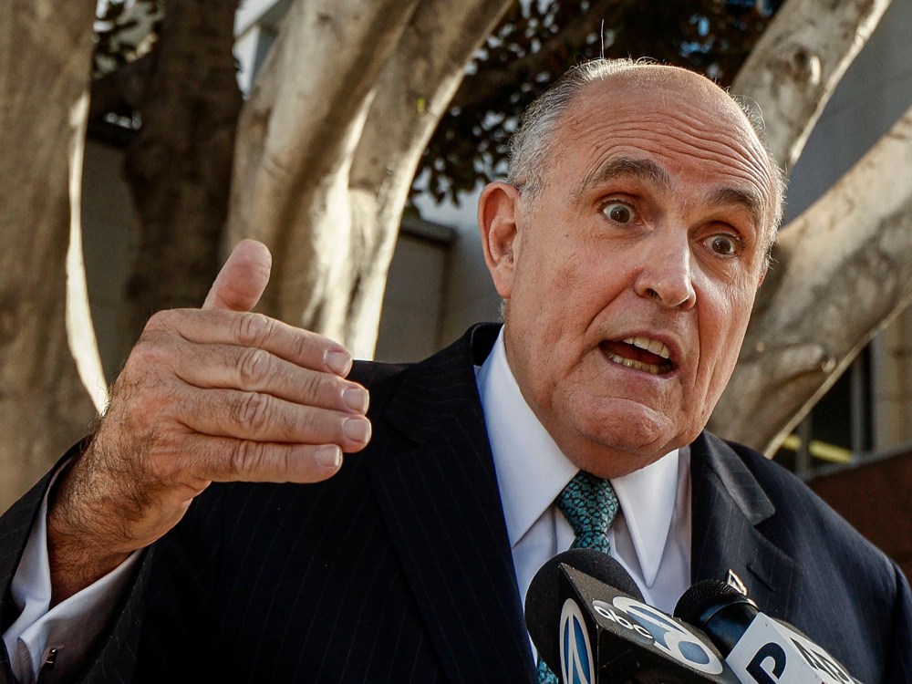 Lawyer and former New York City Mayor Rudy Giuliani comments on a lawsuit filed against video game giant Activision outside Los Angeles Superior court in Los Angeles, Calif., on Oct. 16, 2014. (Photo by Damian Dovarganes/AP)