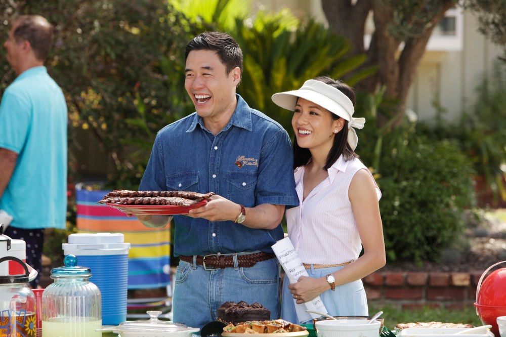 Randall Park, left, and Constance Wu appear in a scene from the new comedy series "Fresh Off the Boat" on ABC. (Nicole Wilder/ABC/AP)