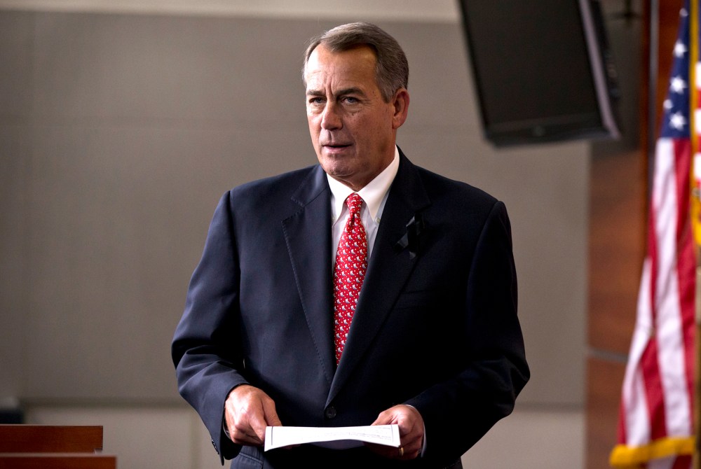 Speaker of the House John Boehner, R-Ohio, arrives to answer questions about the newly minted budget deal at a news conference on Capitol Hill in Washington, Dec. 12, 2013.