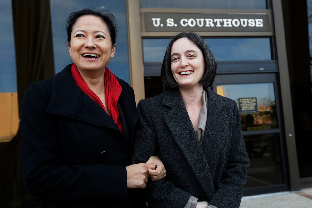 Cleopatra De Leon and partner, Nicole Dimetman, arrive at the U.S. Federal Courthouse in San Antonio, Feb. 12, 2014.