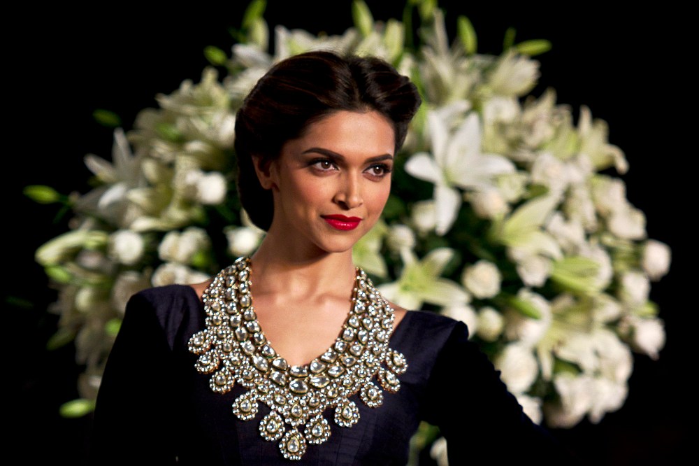 In this Sunday, Aug 4, 2013, photo Bollywood actor Deepika Padukone is seen at an event during the Delhi Couture Week in New Delhi, India. (Photo by Tsering Topgyal/AP)