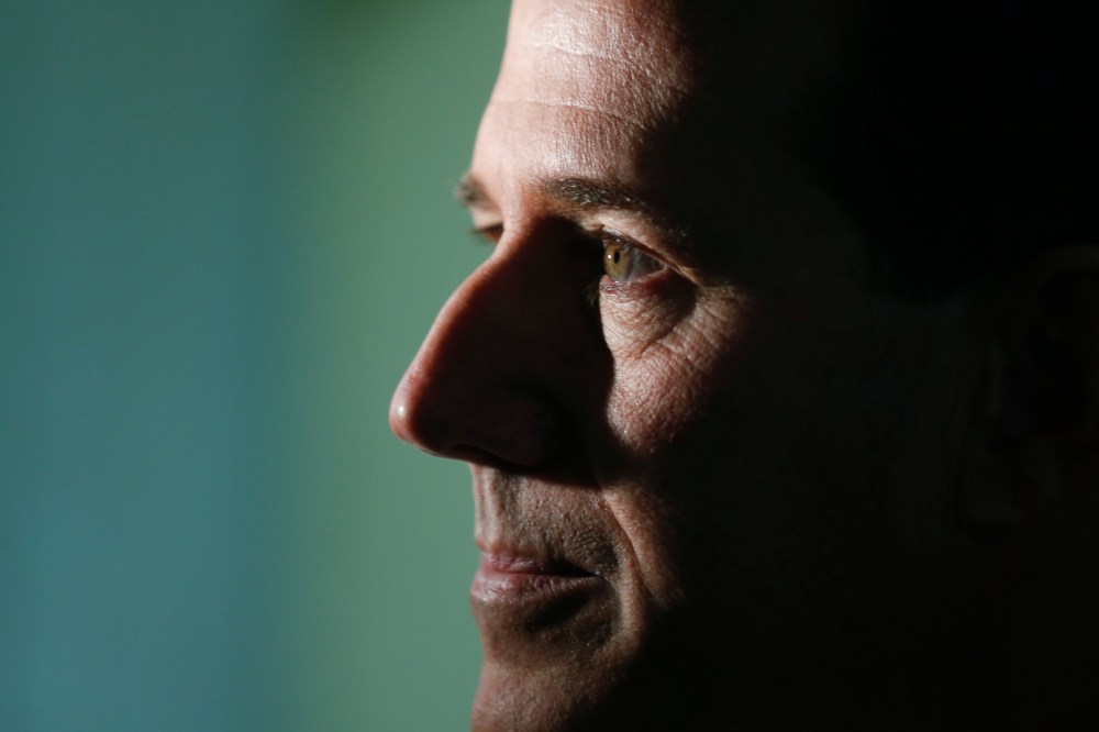 Former Republican presidential candidate and US Sen. Rick Santorum talks to reporters at the Capitol on March 17, 2015, in Albany, NY. (Photo by Mike Groll/AP)