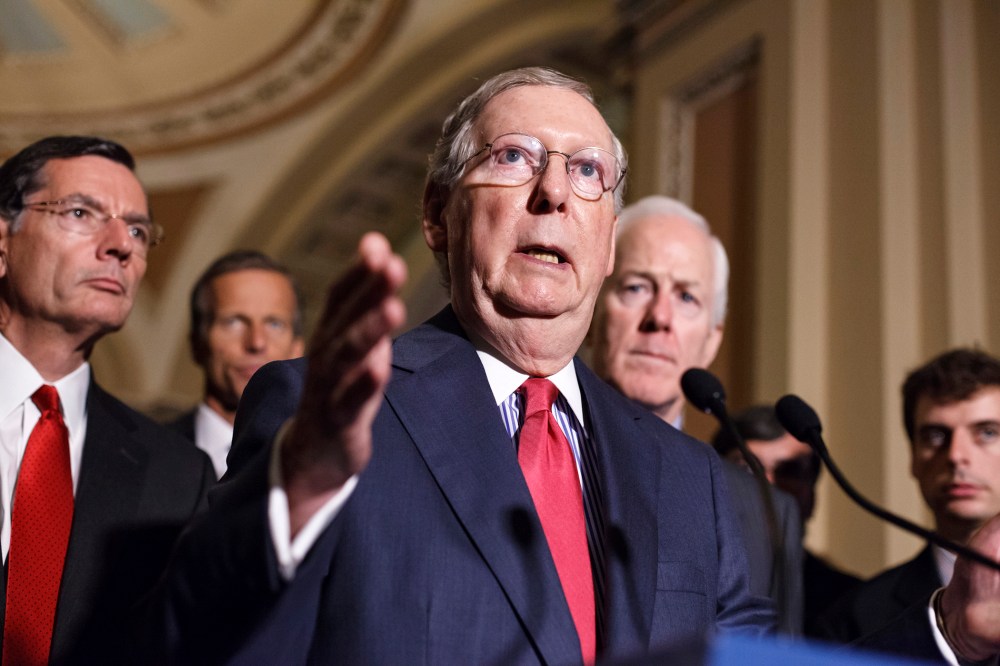 Senate Minority Leader Mitch McConnell speaks to reporters on Capitol Hill, Sept. 9, 2014. Photo by J. Scott Applewhite/AP.