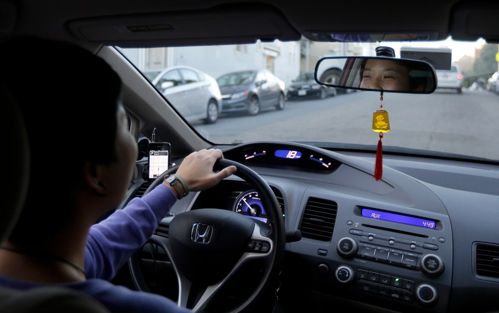 In this Jan. 4, 2013 photo,  Lyft driver Nancy Tcheou drives in San Francisco.