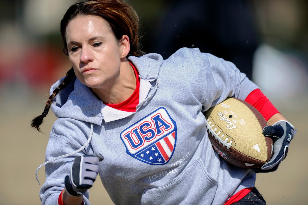 Jennifer Welter participates in a drill during practice, Feb. 13, 2014, in Allen, Texas. (Photo by Cal Sport Media/AP)