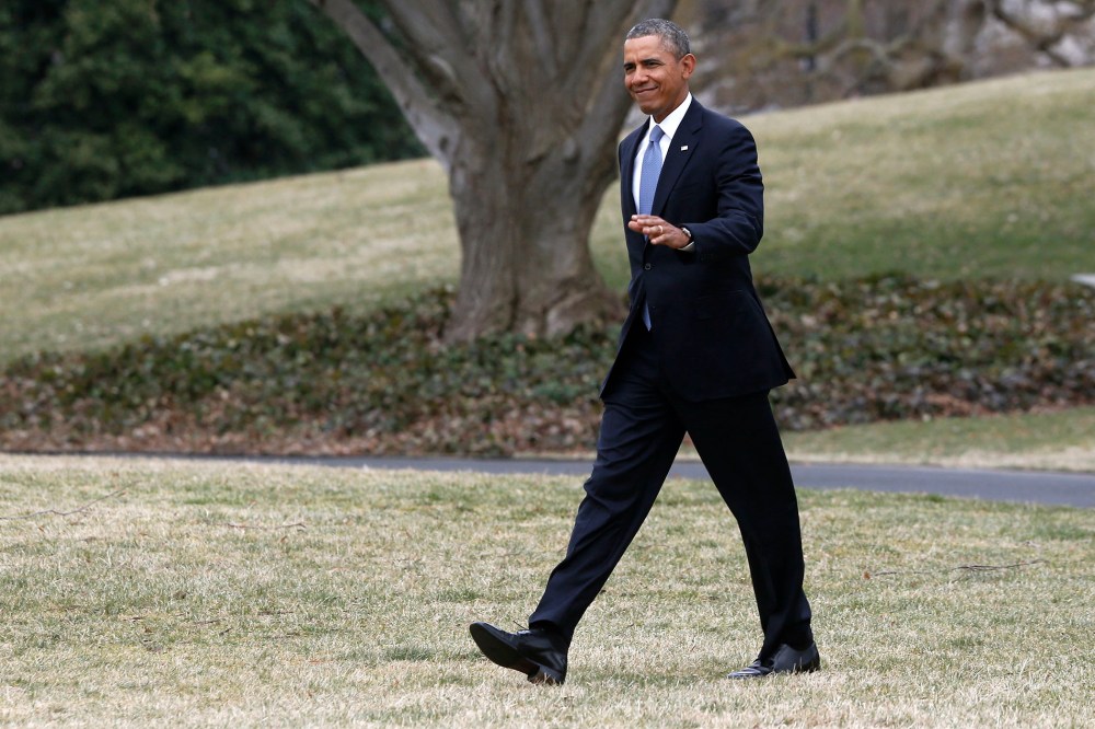 President Barack Obama walks on the South Lawn of the White House in Washington, on March 11, 2014.